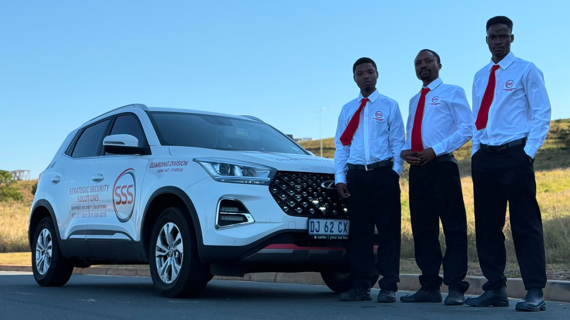SSS guarding division vehicle and uniformed officers on site in Durban